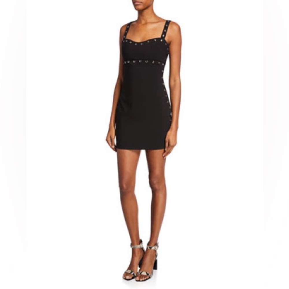 Likely Tessa Sweetheart mini dress. Black and silver grommets. Size 6